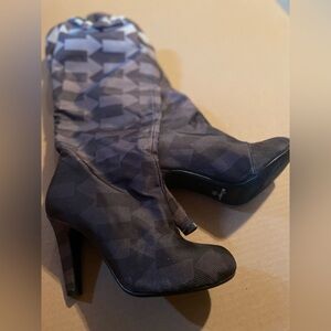 Women’s Elisabeth purple slouch ankle boots.